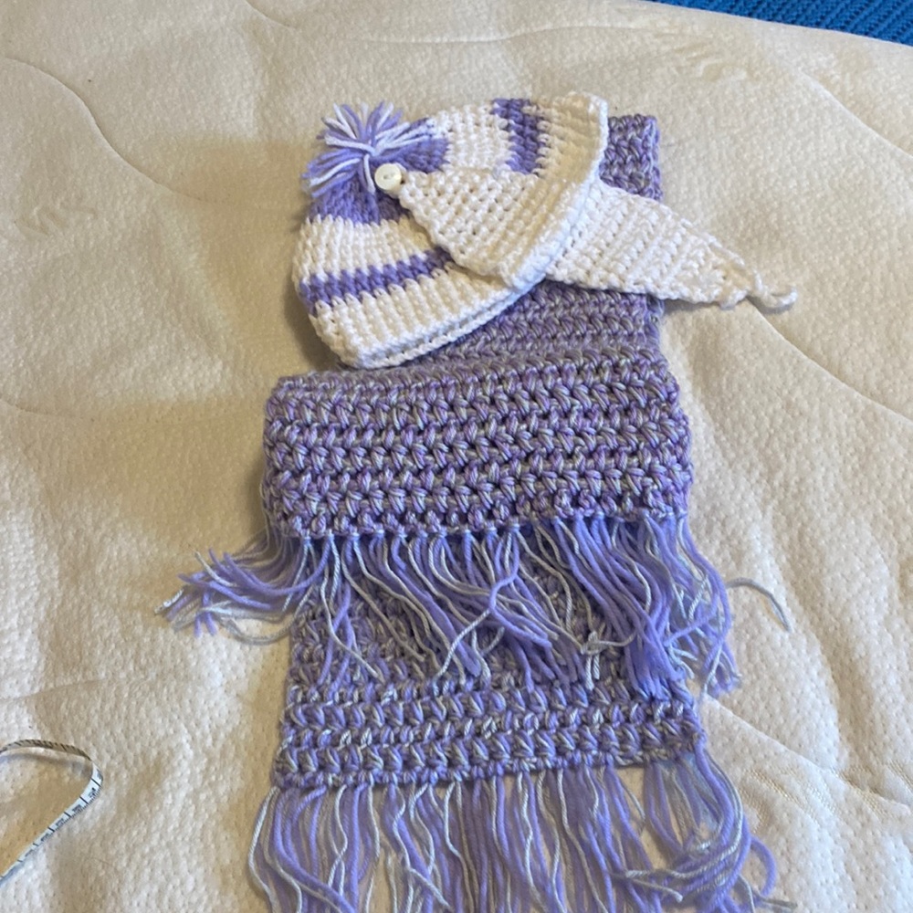 NWOT Hand made hat and scarf set. Hat has ear coverings. Lavender/white color